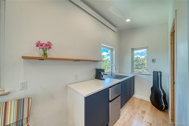 6644 County Road 110, Salida, CO 81201 - kitchen featuring refrigerator, light wood-type flooring, recessed lighting, light countertops, and blue cabinetry