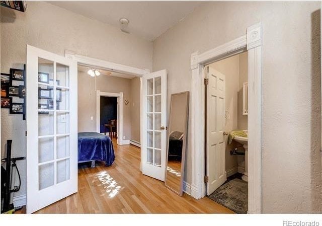 1767 N Washington St, Denver, CO 80203 - hall with french doors and wood finished floors