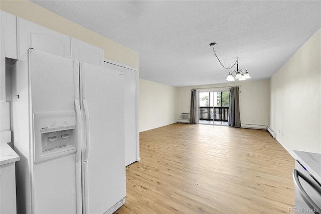 kitchen with light wood-style flooring, stainless steel dishwasher, white cabinetry, white fridge with ice dispenser, and an inviting chandelier