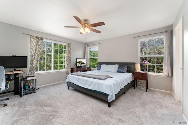 1385 W 112th Ave Unit D, Denver, CO 80234 - bedroom featuring baseboards, carpet floors, and an office area