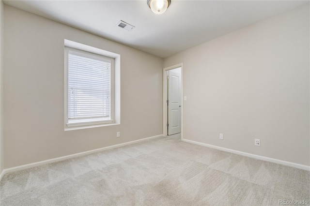 3386 Valentia St, Denver, CO 80238 - spare room featuring light colored carpet and baseboards