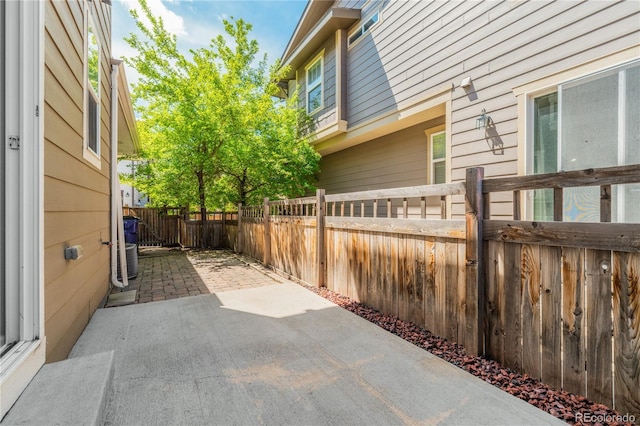 3386 Valentia St, Denver, CO 80238 - view of patio / terrace with fence and central AC unit
