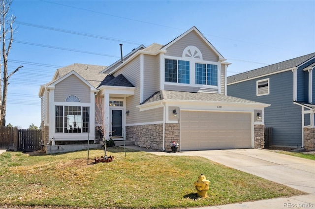 view of front facade featuring fence, driveway, an attached garage, a shingled roof, and stone siding