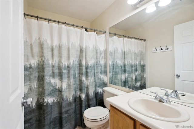 full bath featuring toilet, curtained shower, and vanity