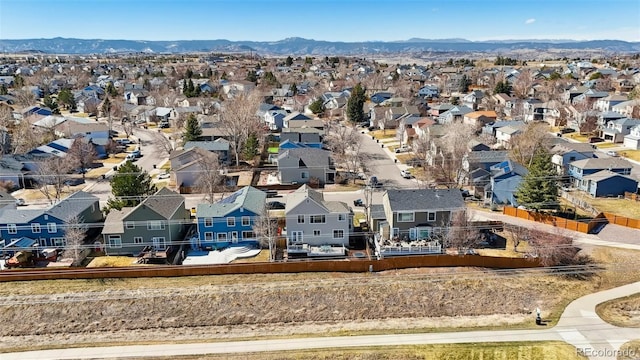 bird's eye view with a residential view and a mountain view