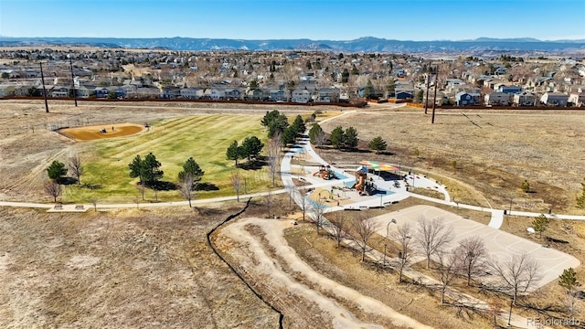 bird's eye view featuring a mountain view and a residential view