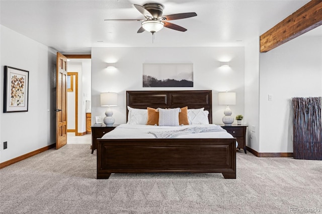 bedroom with beamed ceiling, ceiling fan, and light carpet