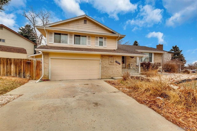 view of front of home featuring driveway, a chimney, an attached garage, fence, and brick siding