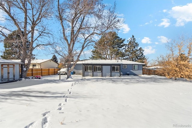 view of snow covered house