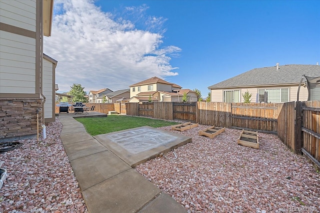 view of yard with a patio area