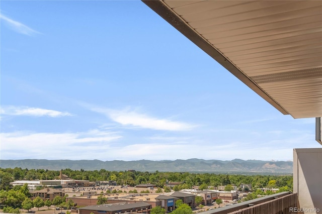 balcony featuring a mountain view