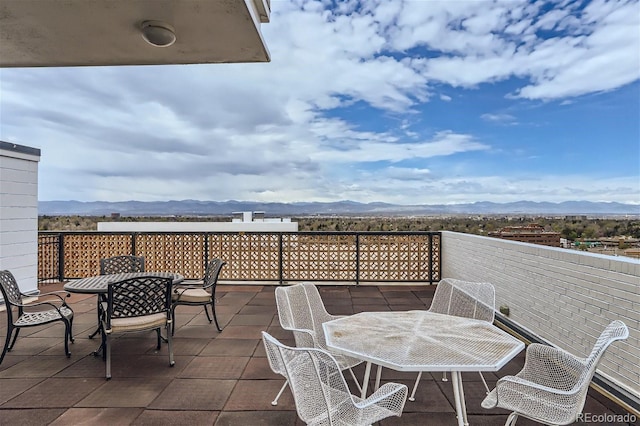 view of patio / terrace with a mountain view