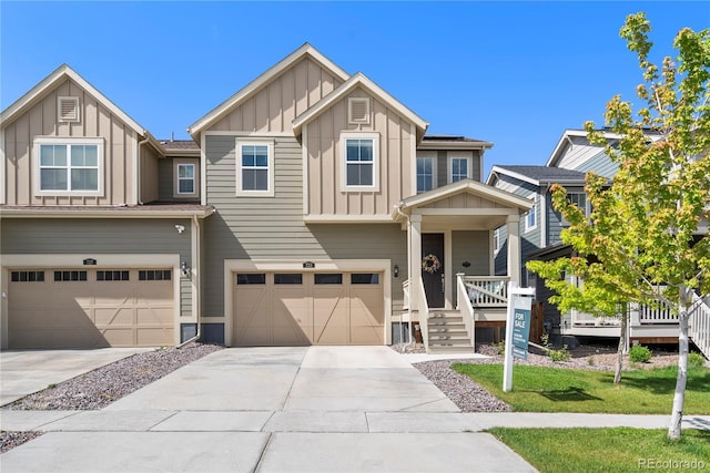 723 176th Ave, Broomfield, CO 80023 - view of front of property with board and batten siding, an attached garage, and concrete driveway