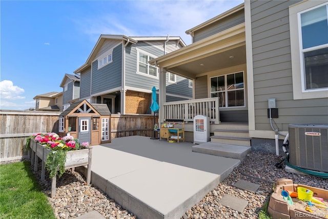 723 176th Ave, Broomfield, CO 80023 - back of property featuring cooling unit and a patio area