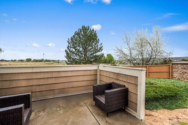 15800 E 121st Ave Unit 4K, Brighton, CO 80603 - view of patio featuring fence