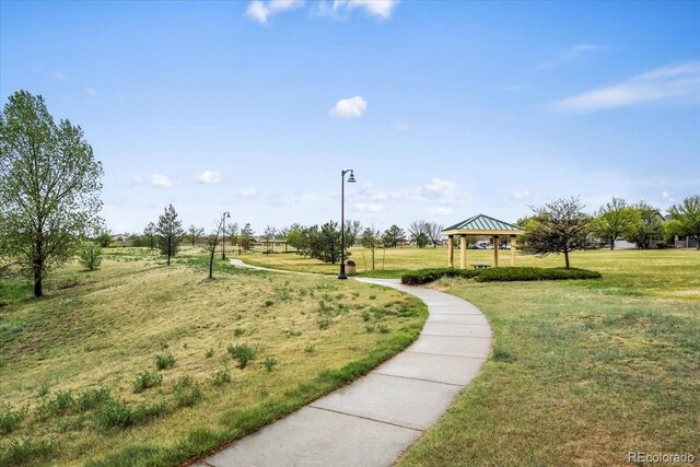 15800 E 121st Ave Unit 4K, Brighton, CO 80603 - view of property's community featuring a gazebo and a yard