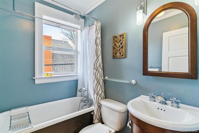 bathroom featuring a sink, toilet, and ornamental molding