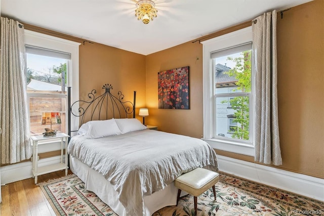 bedroom featuring wood finished floors