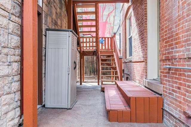 view of patio / terrace featuring stairway