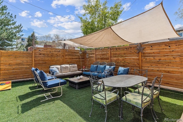view of yard with a fenced backyard and an outdoor hangout area