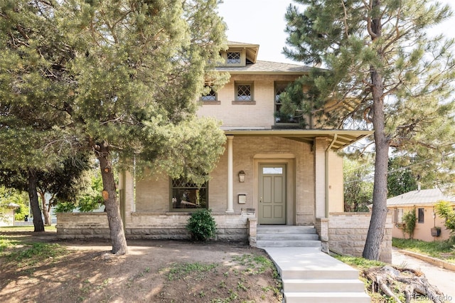 3330 Bruce Randolph Ave, Denver, CO 80205 - view of front of home featuring brick siding