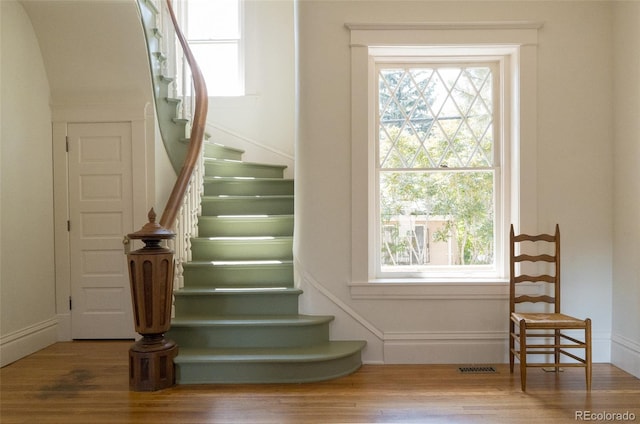 3330 Bruce Randolph Ave, Denver, CO 80205 - stairway featuring wood finished floors
