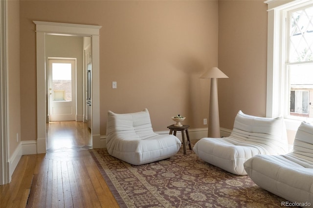 3330 Bruce Randolph Ave, Denver, CO 80205 - sitting room featuring light wood finished floors and baseboards