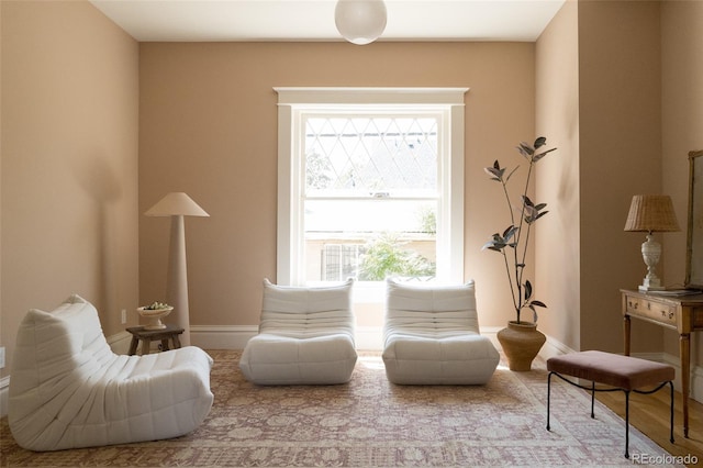 3330 Bruce Randolph Ave, Denver, CO 80205 - sitting room featuring plenty of natural light and baseboards