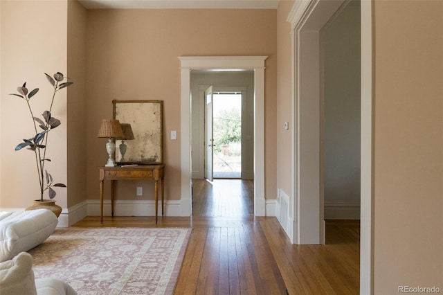 3330 Bruce Randolph Ave, Denver, CO 80205 - foyer entrance with wood-type flooring