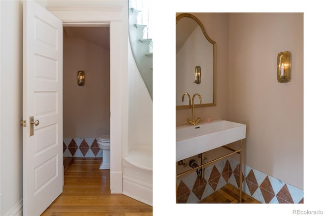 3330 Bruce Randolph Ave, Denver, CO 80205 - bathroom featuring toilet, wood finished floors, and vanity