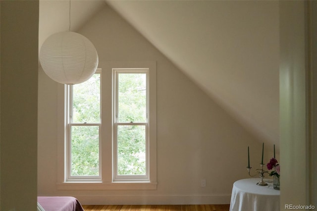 3330 Bruce Randolph Ave, Denver, CO 80205 - bonus room with vaulted ceiling and wood finished floors
