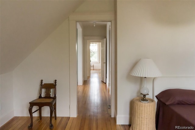 3330 Bruce Randolph Ave, Denver, CO 80205 - hallway with light wood-style flooring and baseboards