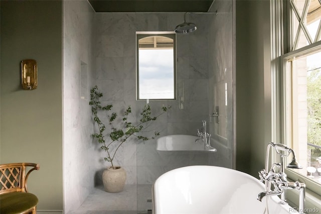 3330 Bruce Randolph Ave, Denver, CO 80205 - full bathroom featuring a freestanding bath and a shower