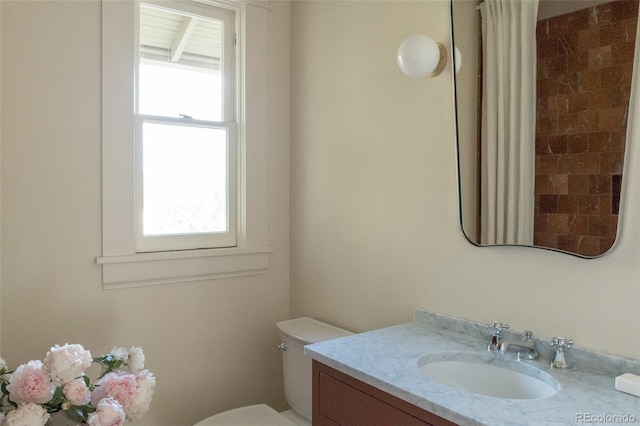 3330 Bruce Randolph Ave, Denver, CO 80205 - bathroom with vanity and a shower with curtain