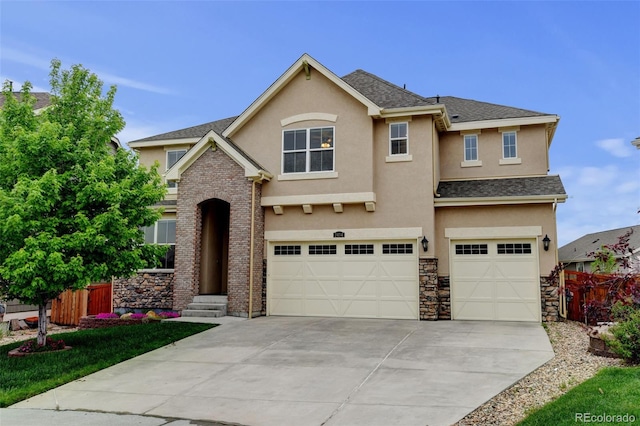 2454 Ambience Ln, Castle Rock, CO 80109 - traditional-style house with stucco siding, a garage, and driveway