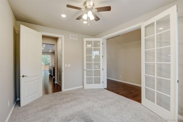 2454 Ambience Ln, Castle Rock, CO 80109 - spare room featuring french doors, dark colored carpet, a ceiling fan, baseboards, and recessed lighting