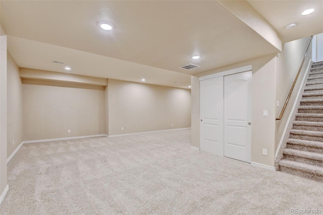 2454 Ambience Ln, Castle Rock, CO 80109 - finished basement with carpet floors, stairway, recessed lighting, and baseboards