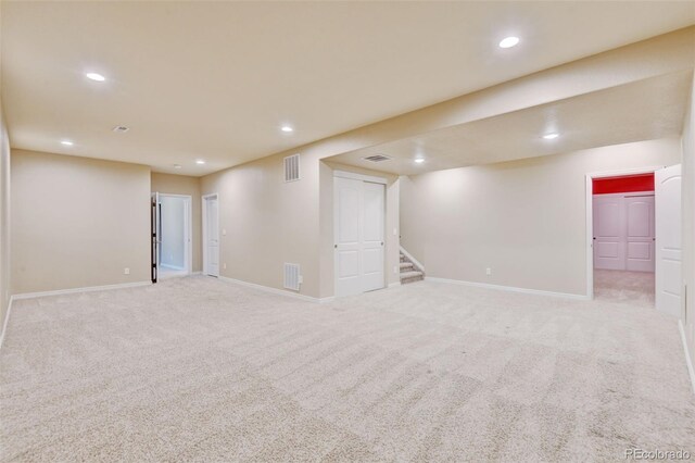 2454 Ambience Ln, Castle Rock, CO 80109 - finished basement featuring baseboards, stairway, carpet flooring, and recessed lighting
