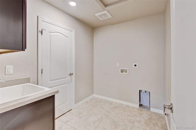 2454 Ambience Ln, Castle Rock, CO 80109 - laundry area featuring hookup for an electric dryer, washer hookup, light tile patterned flooring, and baseboards