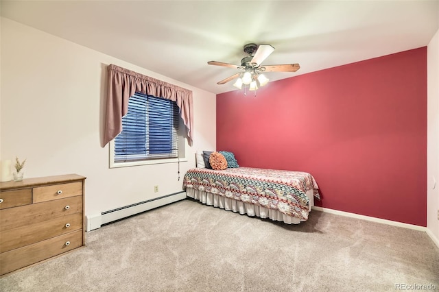 3245 S Kendall St, Denver, CO 80227 - carpeted bedroom featuring baseboard heating and a ceiling fan