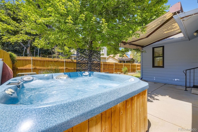 3245 S Kendall St, Denver, CO 80227 - view of patio with a hot tub