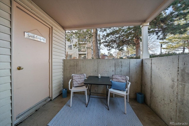 view of patio / terrace featuring fence