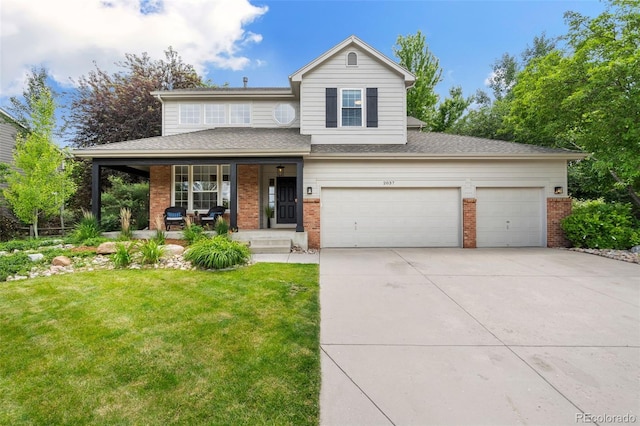 2037 River W Dr, Windsor, CO 80550 - view of front of house featuring brick siding, a porch, driveway, a front yard, and an attached garage