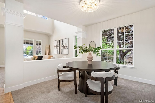 2037 River W Dr, Windsor, CO 80550 - carpeted dining room featuring baseboards and a chandelier