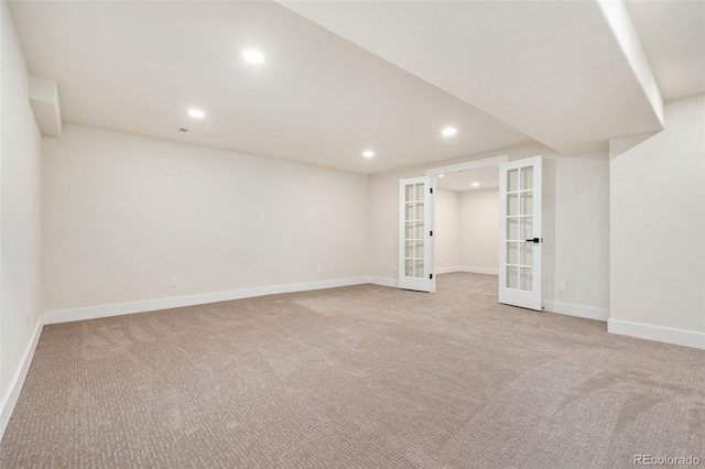 2037 River W Dr, Windsor, CO 80550 - finished basement with french doors, recessed lighting, and carpet flooring