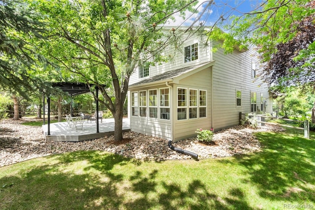 2037 River W Dr, Windsor, CO 80550 - back of house with a yard and a patio