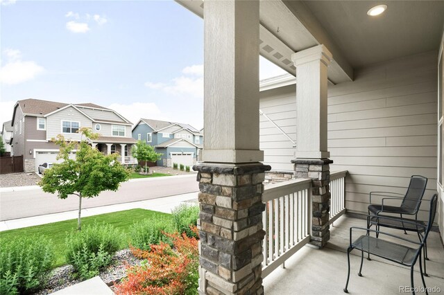 14454 Grape Way, Thornton, CO 80602 - porch featuring a residential view