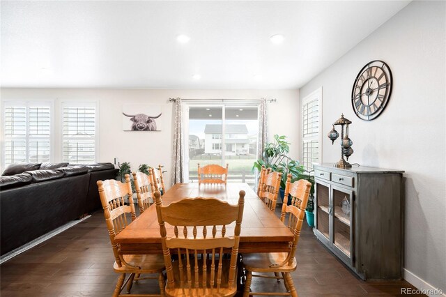 14454 Grape Way, Thornton, CO 80602 - dining area with dark wood-type flooring, recessed lighting, and baseboards