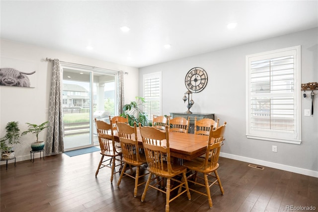 14454 Grape Way, Thornton, CO 80602 - dining room with dark wood-style floors, baseboards, and recessed lighting