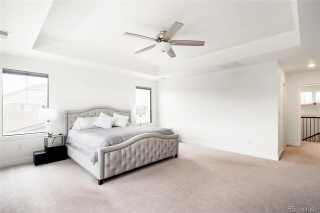 14454 Grape Way, Thornton, CO 80602 - bedroom featuring a raised ceiling, crown molding, carpet, baseboards, and ceiling fan
